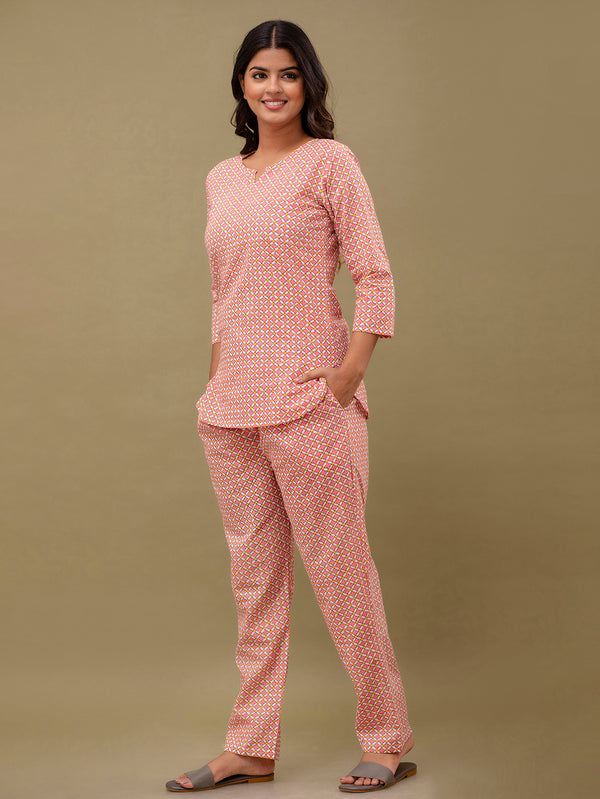 Pink Printed Cotton Night Suit with V-Neck Kurti & Ankle-Length Pants