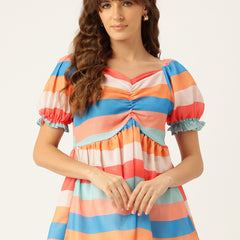 Cropped v-neck peplum puff sleeved top with digital print on linen fabric.