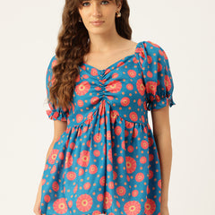 Cropped v-neck peplum puff sleeved top with digital print on linen fabric.