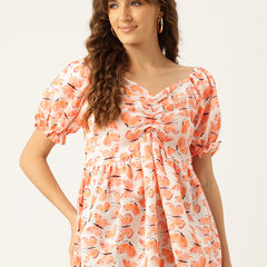 Cropped v-neck peplum puff sleeved top with digital print on linen fabric.