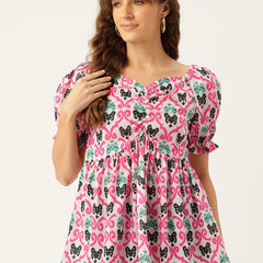 Cropped v-neck peplum puff sleeved top with digital print on linen fabric.