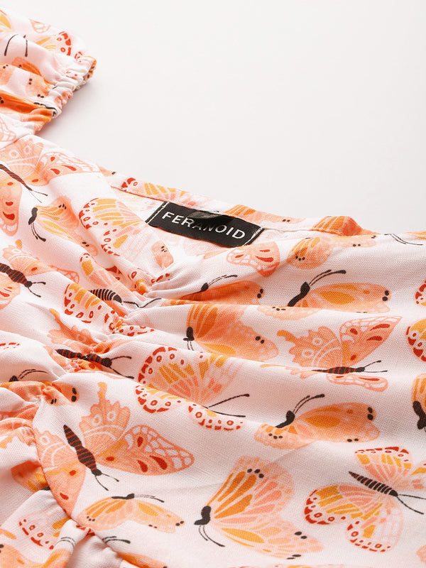 Cropped v-neck peplum puff sleeved top with digital print on linen fabric.