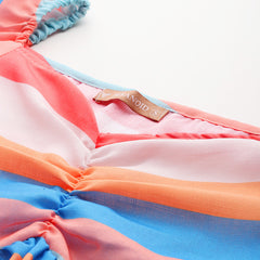 Cropped v-neck peplum puff sleeved top with digital print on linen fabric.