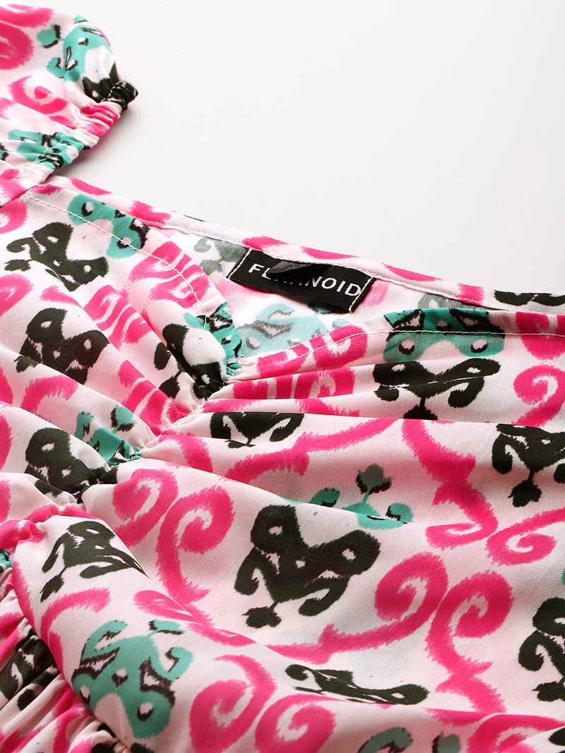 Cropped v-neck peplum puff sleeved top with digital print on linen fabric.