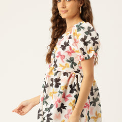 Cropped v-neck peplum puff sleeved top with digital print on linen fabric.