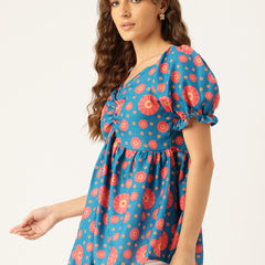 Cropped v-neck peplum puff sleeved top with digital print on linen fabric.