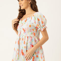 Cropped v-neck peplum puff sleeved top with digital print on linen fabric.