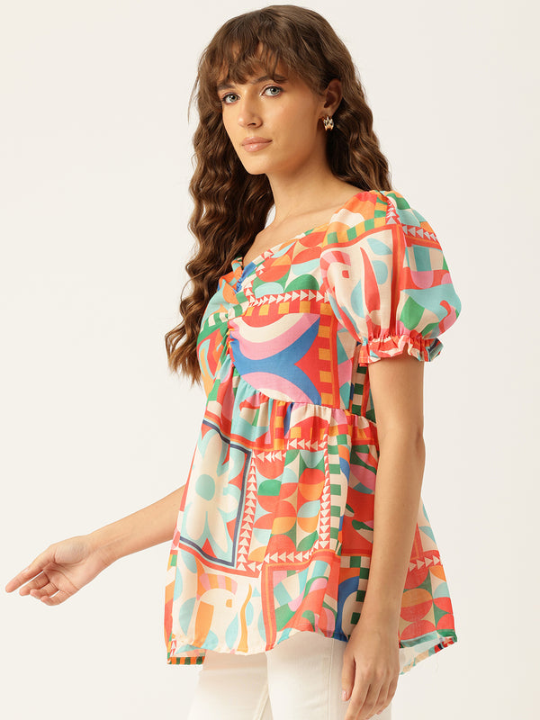 Cropped v-neck peplum puff sleeved top with digital print on linen fabric.