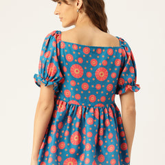 Cropped v-neck peplum puff sleeved top with digital print on linen fabric.