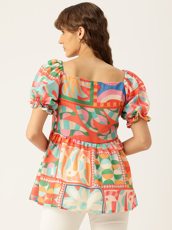 Cropped v-neck peplum puff sleeved top with digital print on linen fabric.