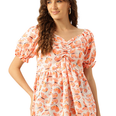 Cropped v-neck peplum puff sleeved top with digital print on linen fabric.