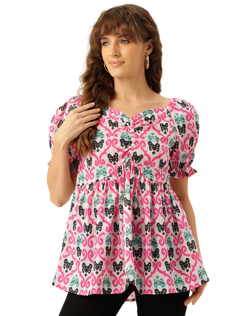 Cropped v-neck peplum puff sleeved top with digital print on linen fabric.