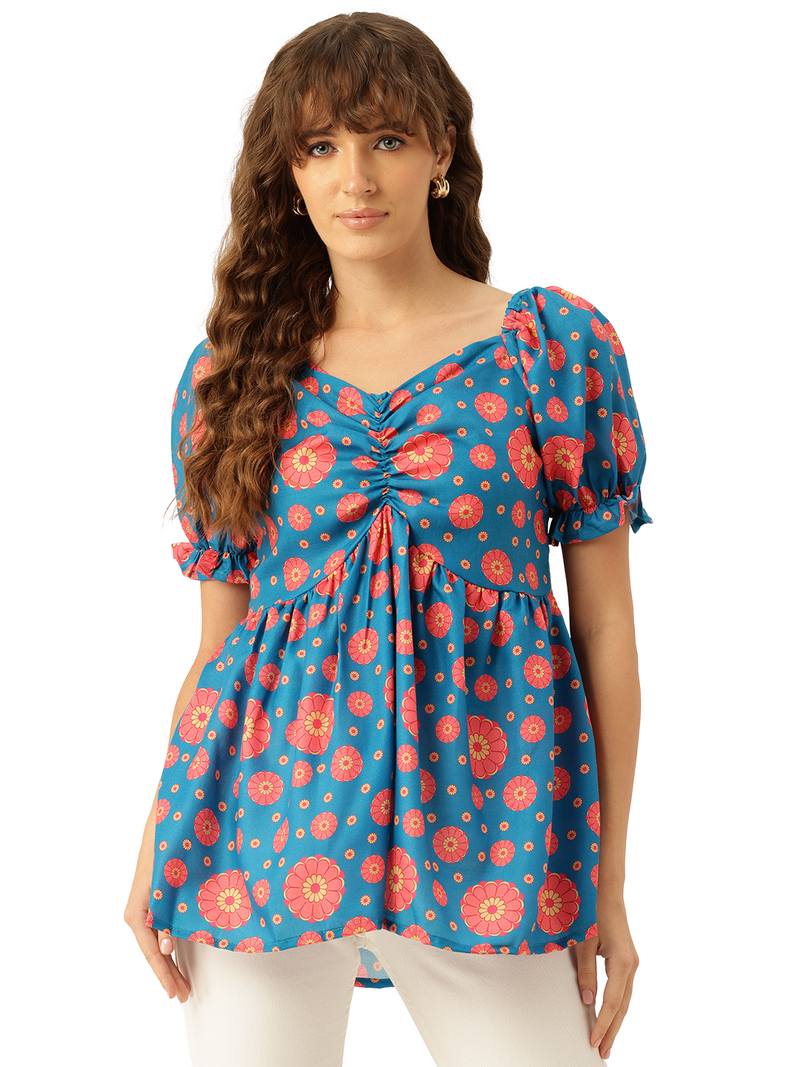 Cropped v-neck peplum puff sleeved top with digital print on linen fabric.