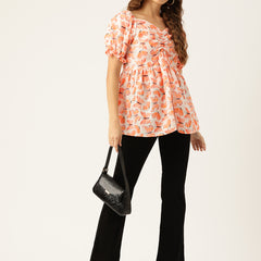 Cropped v-neck peplum puff sleeved top with digital print on linen fabric.