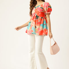 Cropped v-neck peplum puff sleeved top with digital print on linen fabric.
