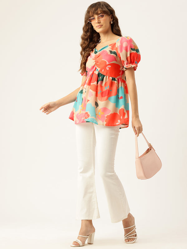 Cropped v-neck peplum puff sleeved top with digital print on linen fabric.