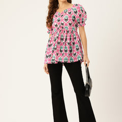 Cropped v-neck peplum puff sleeved top with digital print on linen fabric.