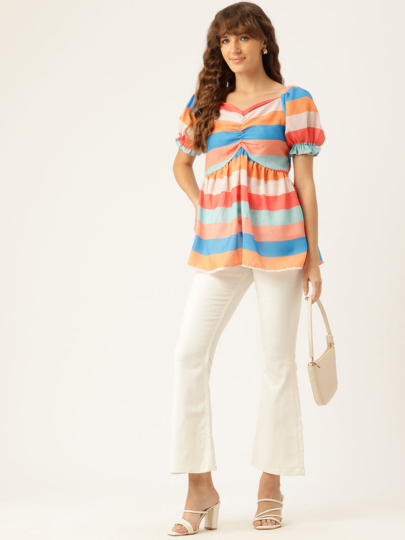 Cropped v-neck peplum puff sleeved top with digital print on linen fabric.