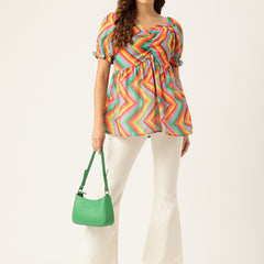 Cropped v-neck peplum puff sleeved top with digital print on linen fabric.