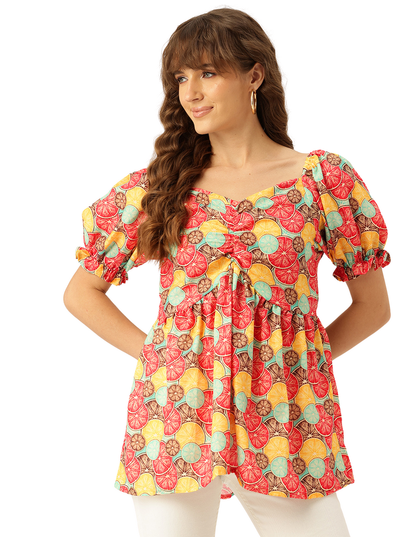 Cropped v-neck peplum puff sleeved top with digital print on linen fabric.