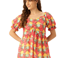 Cropped v-neck peplum puff sleeved top with digital print on linen fabric.
